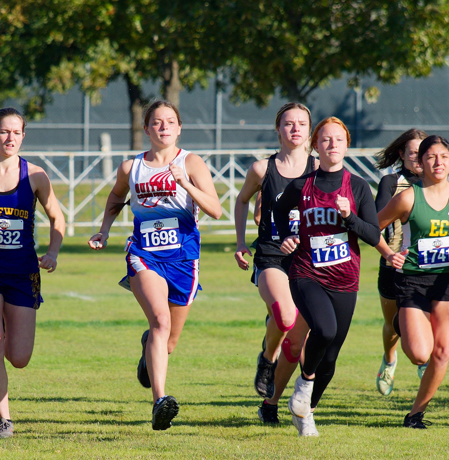Madyson Pence finds some breathing room in the crowded start to the 2021 state cross country meet. Pence would finish in 13:00.4 for 61st place. [View more of the competition.]